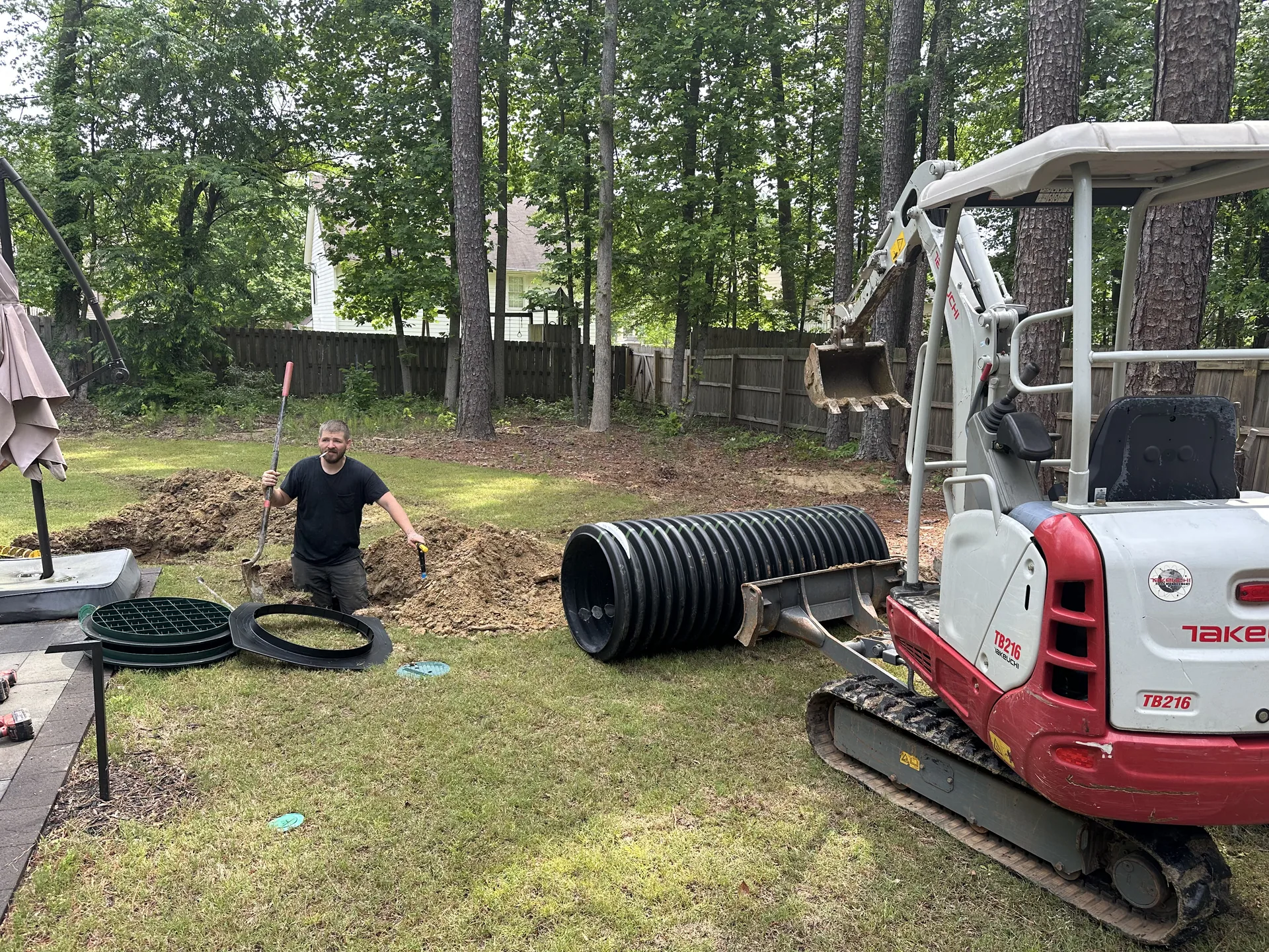 Backyard drainage installation takeuchi mini excavator