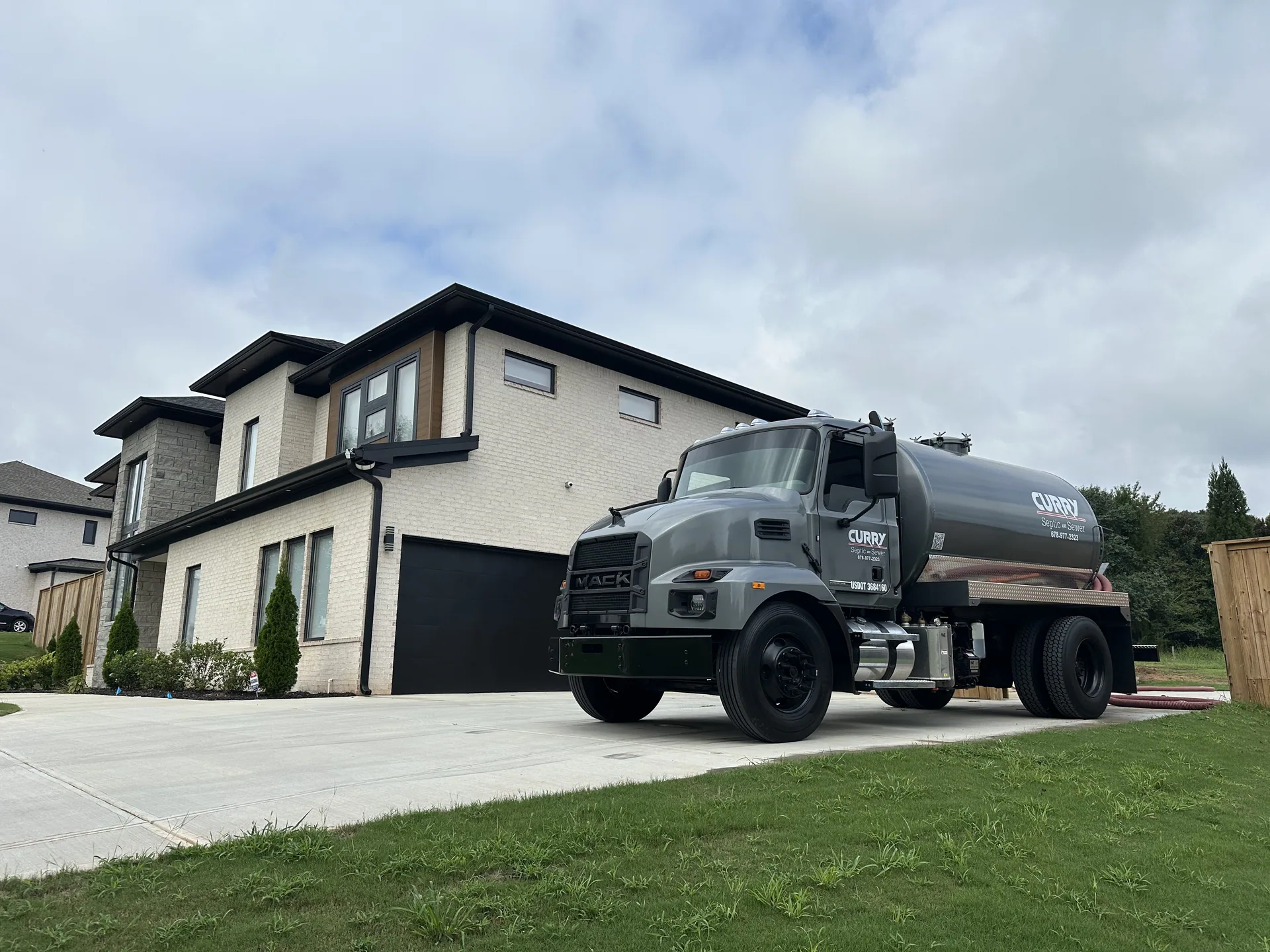 Curry septic truck residential driveway service